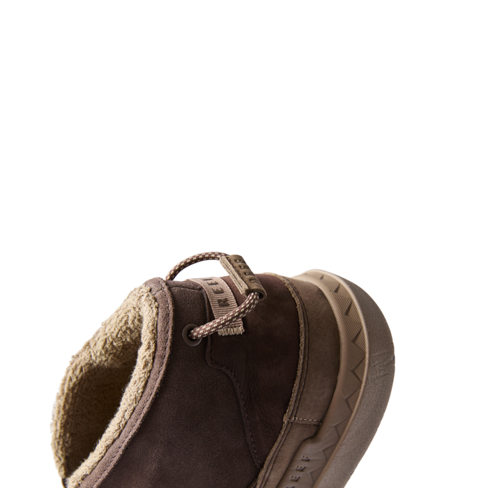 Rambler Hi men's brown boot facing left, close-up of heel with comfort cushioning and beach-inspired design.