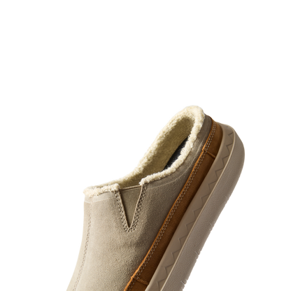 Rambler Mule facing left, close-up of upper and heel with soft-rebound cushioning and cozy lining for all-day comfort.