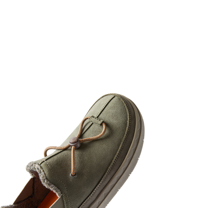 Rambler shoe facing left, close-up on front with soft suede upper, elastic laces, and cushioned sole for all-day comfort.