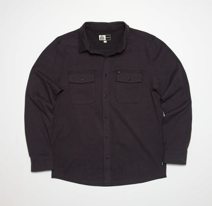 Front view of the Raymond Ls Shirt in dark fabric, featuring button closures and dual chest pockets.