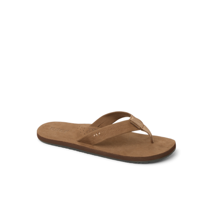 Reef Draftsmen men's brown sandal facing left, close-up on cushioned footbed with arch support for beach comfort