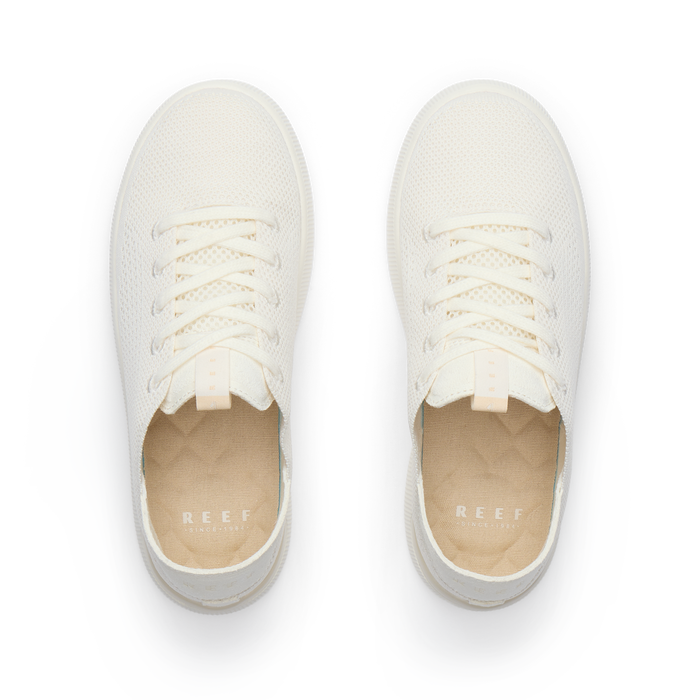 Reef Neptune women's cream knit sneakers top view facing up, featuring soft cushioning and arch support, beach inspired comfort.