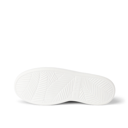 Bottom sole view of the Reef Neptune women's sandal showcasing durable, water-friendly outsole with surf-inspired traction.