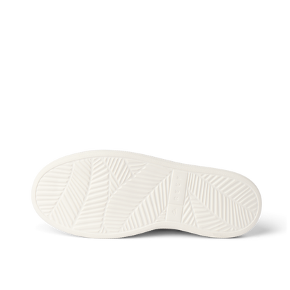 Reef Neptune adult women's shoe outsole facing up, showing durable, water-friendly sole with beach-inspired pattern.