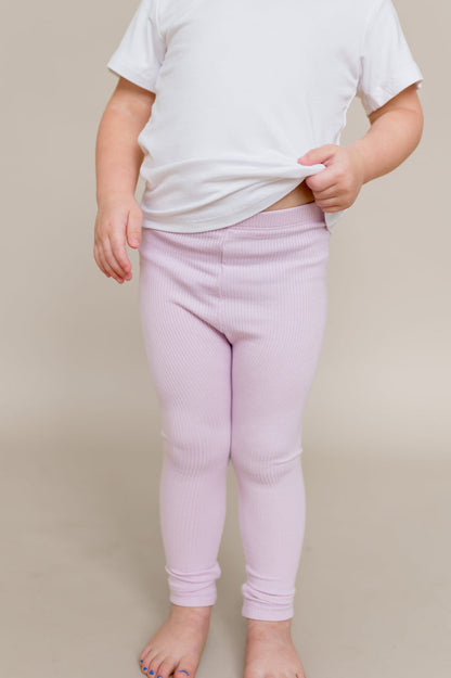 Close up of the Ribbed Leggings in Thistle shown on a young model