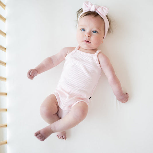 Kyte Baby Ribbed Spaghetti Strap Bodysuit Ribbed Spaghetti Strap Bodysuit in Sakura