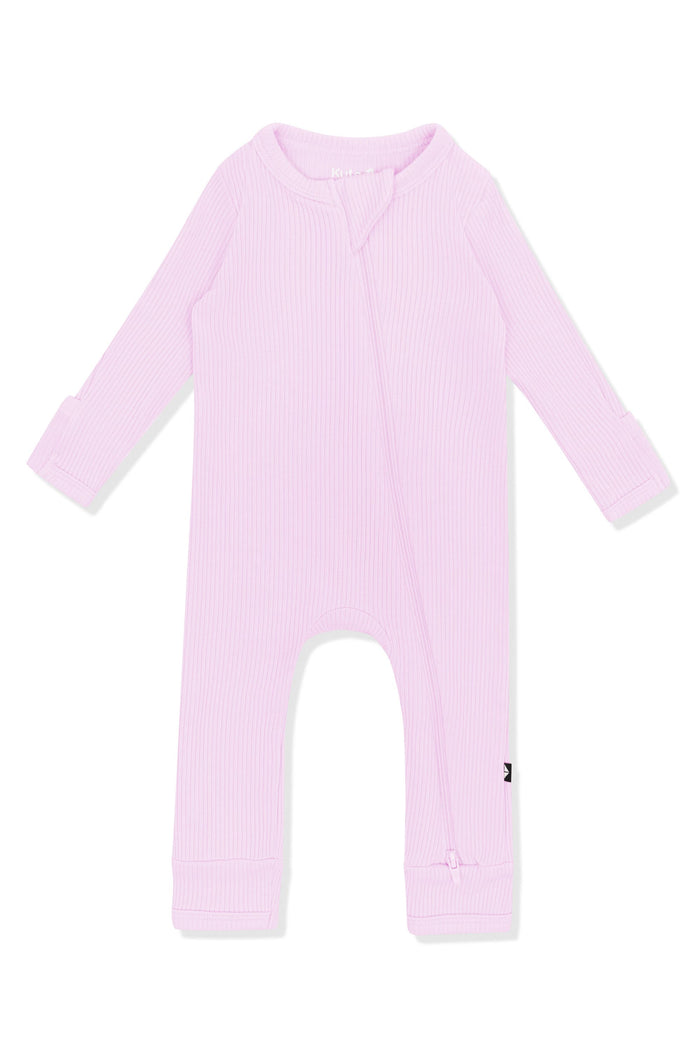 Product photo of the Ribbed Zipper Romper in Thistle shown on a white surface