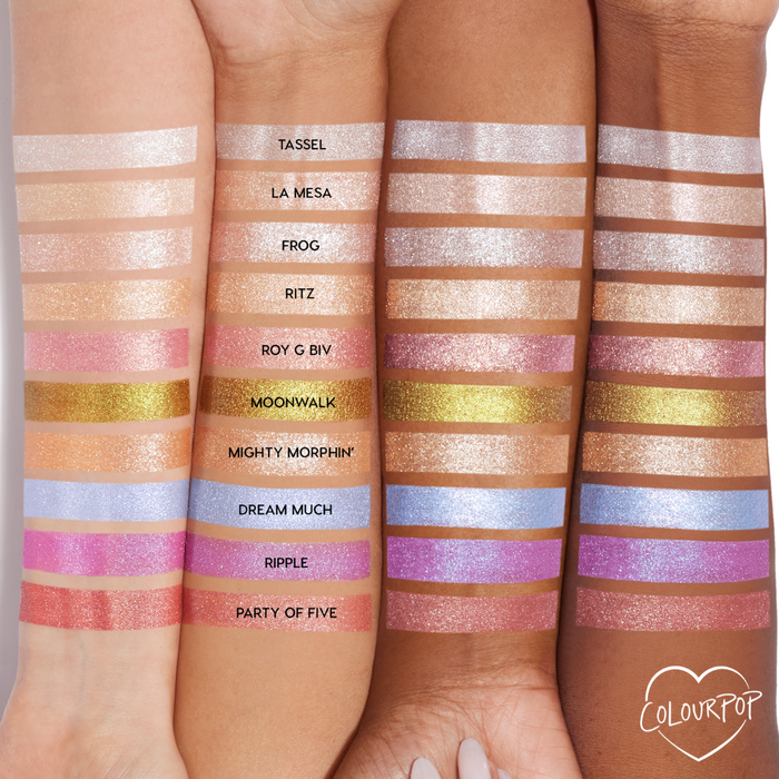 Roy G. Biv Super Shock Shadow by ColourPop swatched - sparkling rosy pink with fine shimmer - striped on three forearms of different skin tones, displayed among labeled shades under studio lighting to show color payoff and shift.