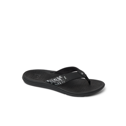 Santa Ana black women's flip flop facing right, featuring soft-rebound cushioning and anatomical arch support for beach comfort.