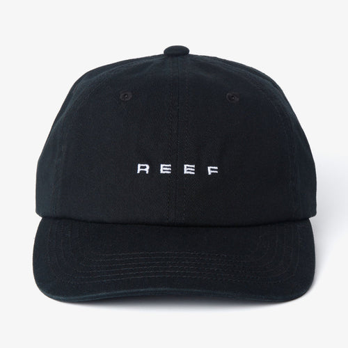 Front view of black Schotts Twill Hat with white REEF logo, featuring lightweight, durable, and comfortable beach-inspired design.