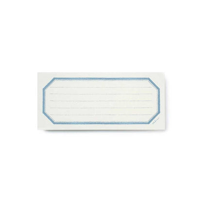 White lined notecard with blue border on white background