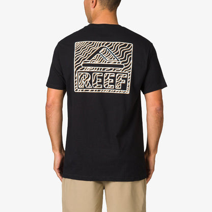 Man wearing a black Strings Tee showing back with REEF logo and wave design, beach-inspired comfort apparel for men.