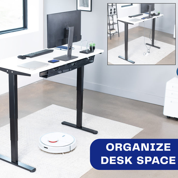 A black mesh cable management system that creates an organized workspace.