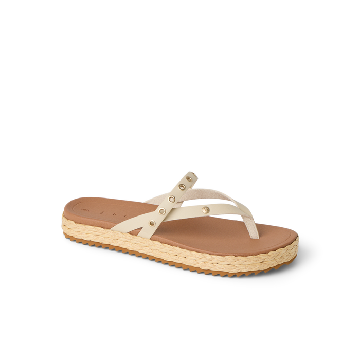 Vista Carmen women's sandal facing right, beige straps with rivets, cushioned footbed and textured sole, beach-inspired comfort.