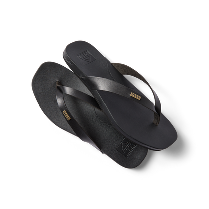 Vista Lune women’s black flip flops facing right, showing top and bottom with soft-rebound cushioning and arch support