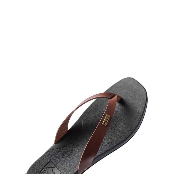 Vista Lune women's sandal facing left, close-up on soft-rebound cushioned footbed with chocolate brown straps for beach comfort.