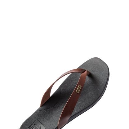 Vista Lune women's sandal facing left, close-up on soft-rebound cushioned footbed with chocolate brown straps for beach comfort.