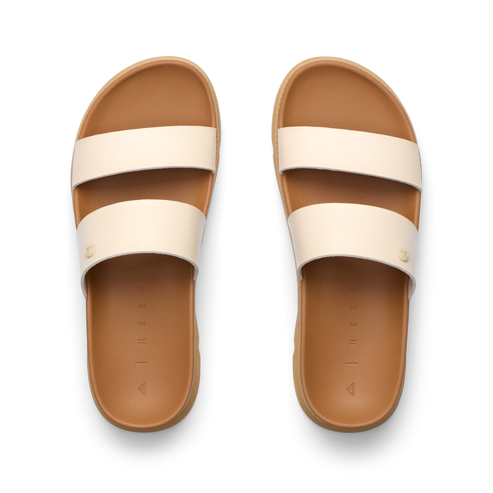 Vista Luxe Thea women's sandals facing upward with two cream straps, cushioned footbed, and anatomical arch support.