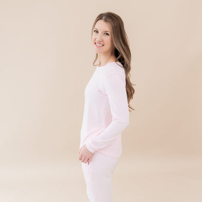 Woman modeling Women's Jogger Pajama Set in Sakura