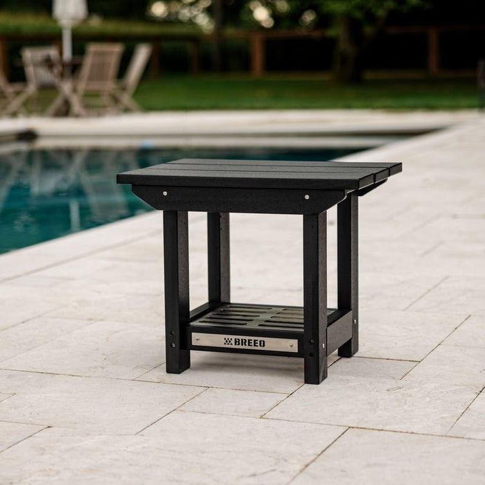 X Series Side Table next to a pool