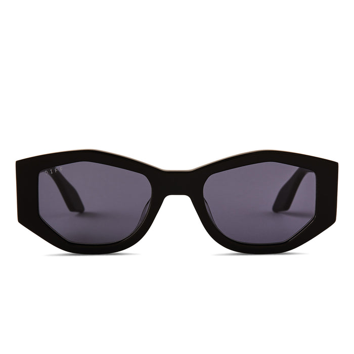diff eyewear zoe oval sunglasses with a black frame and grey polarized lenses front view